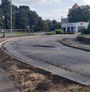 Solid curb at Gilmer Ave